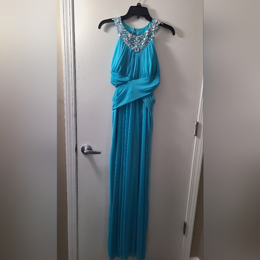 B. Darlin Crisscross Waist Turquoise Prom Dress